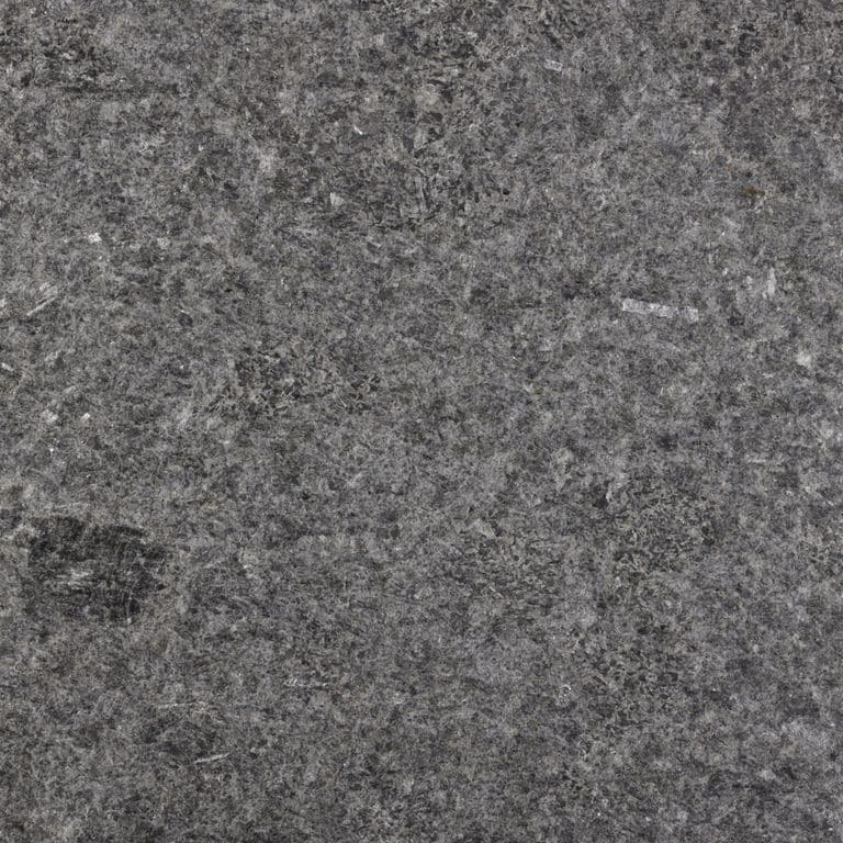 Color/Finish variation image for Granite - Mesabi Black. The surface finish shown is . Dominant colors shown are black and gray; with brown, green and purple secondaries. The color mix creates a cool feeling. Blotched and coarse speckled color patterns.