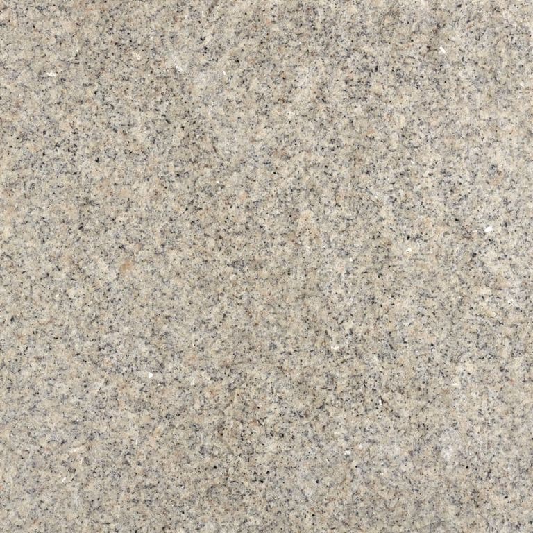 Feature image for Moonlit Rose Granite. Dominant colors shown are beige, gray and tan; with brown, orange/rust, white and cream secondaries. Exhibits "movement" and the color mix creates a warm feeling. Speckled color pattern. Contains some mica and mineral inclusions.