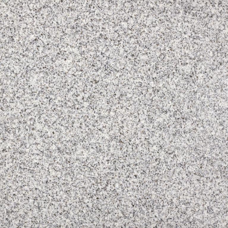 Feature image for Northern White Granite. Dominant colors shown are gray and white; with beige, pink and cream secondaries. Solid and fine speckled color patterns. Contains some mica.