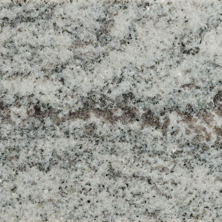 Color/Finish variation image for Silver Cloud Cross-Cut Granite. The surface finish shown is waterjet. The dominant color shown is gray. The color mix creates a cool feeling.