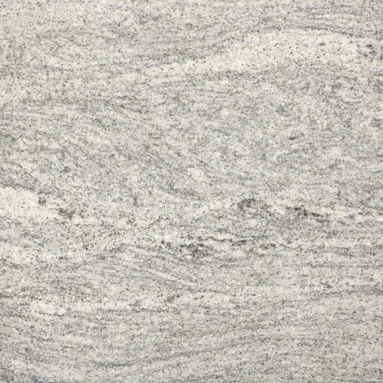 Color/Finish variation image for Granite - Silver Cloud. The dominant color shown is gray; with pink, white and cream secondaries. Exhibits "movement" and the color mix creates a warm feeling. Linear, streaked and fine speckled color patterns.