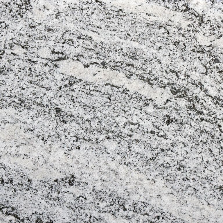 The surface finish shown is honed. Dominant colors shown are gray and white. The color mix creates a cool feeling. Coarse speckled color pattern.