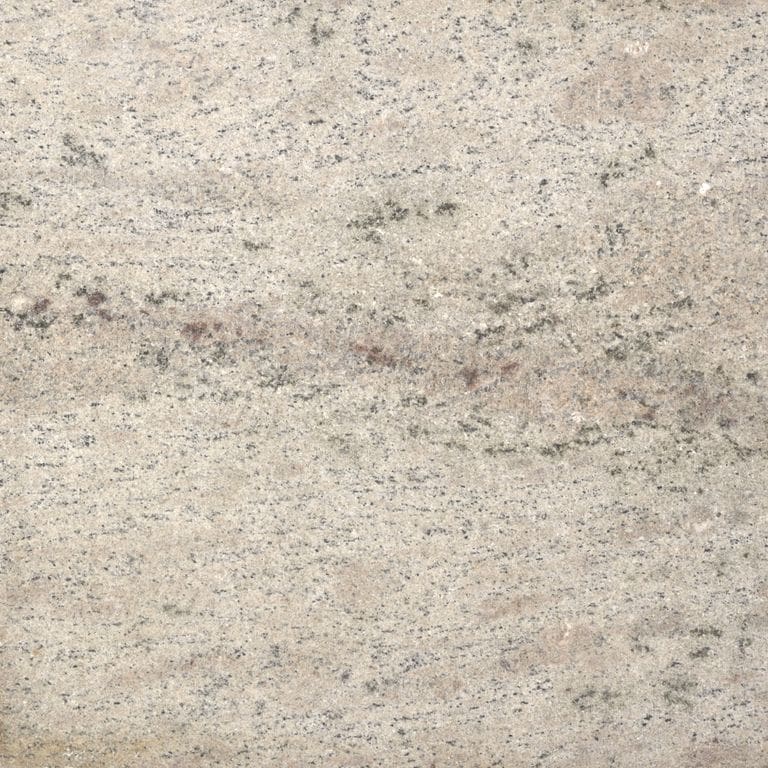 Close-up image for Phoenician Buff Granite. The surface finish shown is sand blasted. The dominant color shown is beige; with gray, pink, tan and cream secondaries. Exhibits "movement" and the color mix creates a warm feeling. Random, speckled, fine speckled and veined color patterns. Contains some mica and mineral inclusions.