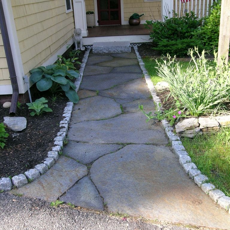 The image shows this material being used in a path pavers application. Speckled and blotched color patterns.