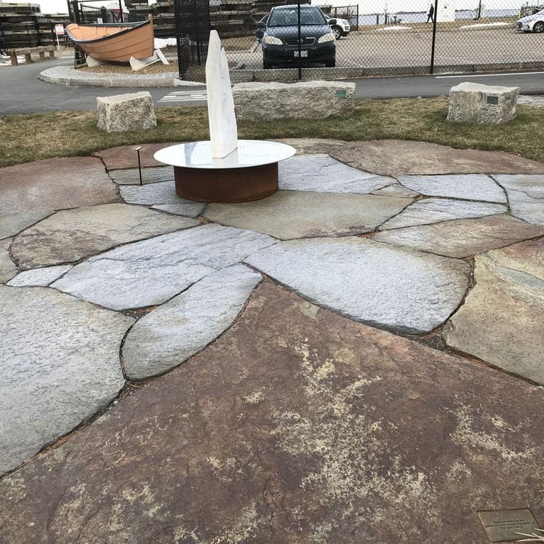 The image shows this material being used in a patio pavers application. Streaked color pattern.