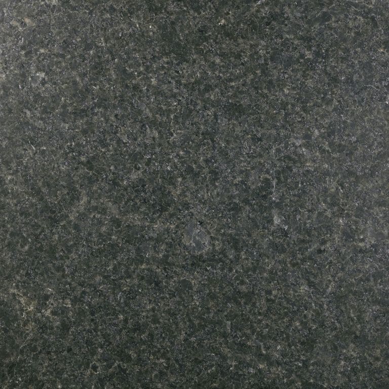 Color/Finish variation image for Granite - Prairie Green. The surface finish shown is antiqued. Dominant colors shown are black and gray; with a green secondary. The color mix creates a cool feeling. Coarse speckled color pattern.