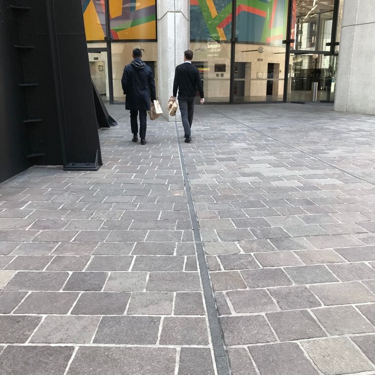 The image shows this material being used for path pavers and patio pavers.