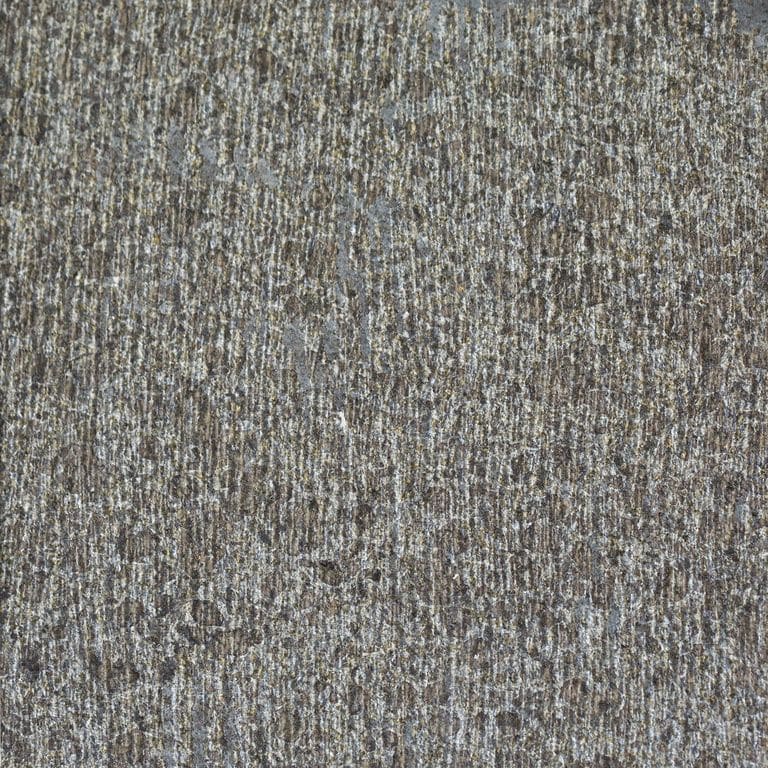 Color/Finish variation image for Ankar Black Basalt. The surface finish shown is adze. The dominant color shown is gray; with purple, white and tan secondaries. Exhibits "movement". Linear, cloudy and coarse speckled color patterns.