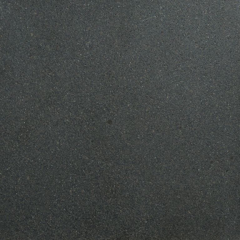 Color/Finish variation image for Ankar Black Basalt. The surface finish shown is honed. Dominant colors shown are black and gray. The color mix creates a cool feeling.