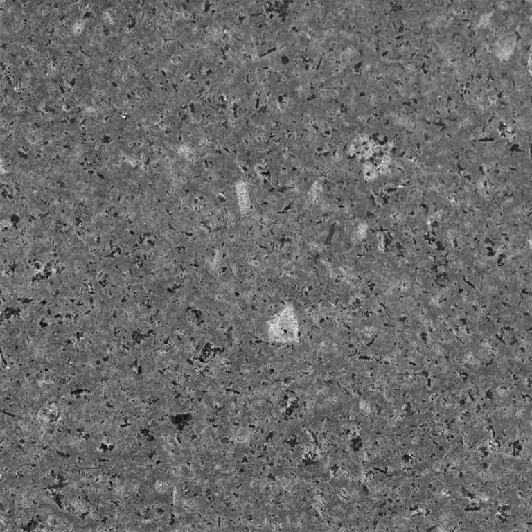 Close-up image for Basaltite. The surface finish shown is polished. The dominant color shown is gray. Exhibits "movement" and the color mix creates a cool feeling. Speckled and blotched color patterns. Contains mineral inclusions.