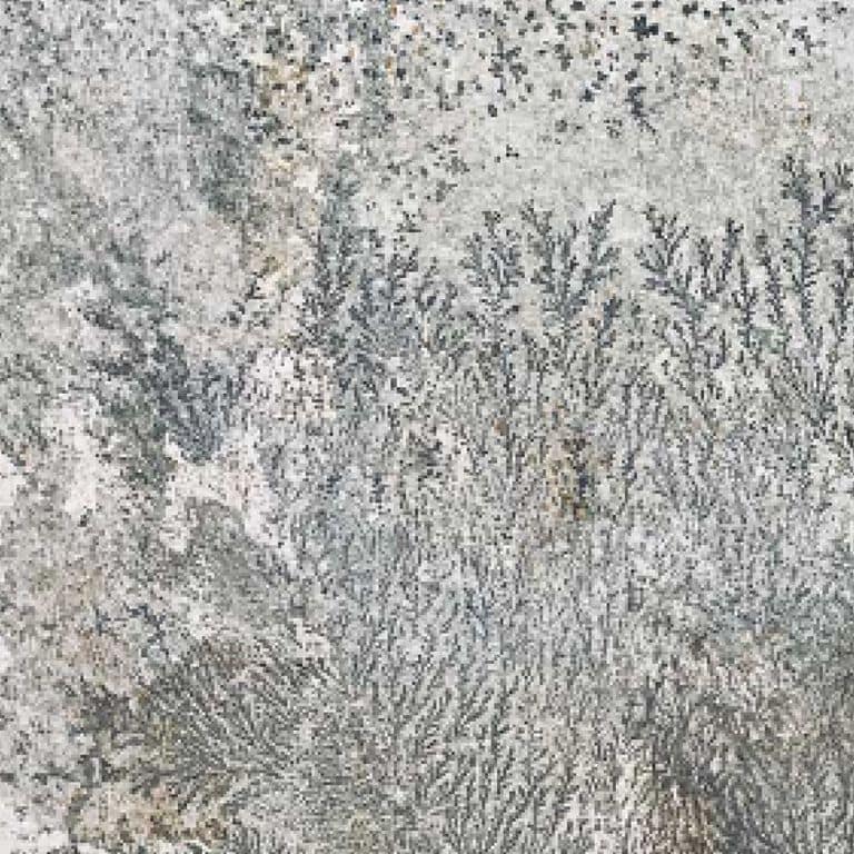 Color/Finish variation image for Greek Quartzite Slate - Seam Face. The dominant color shown is gray; with beige, pink, white and cream secondaries. Exhibits "movement". Random color pattern.