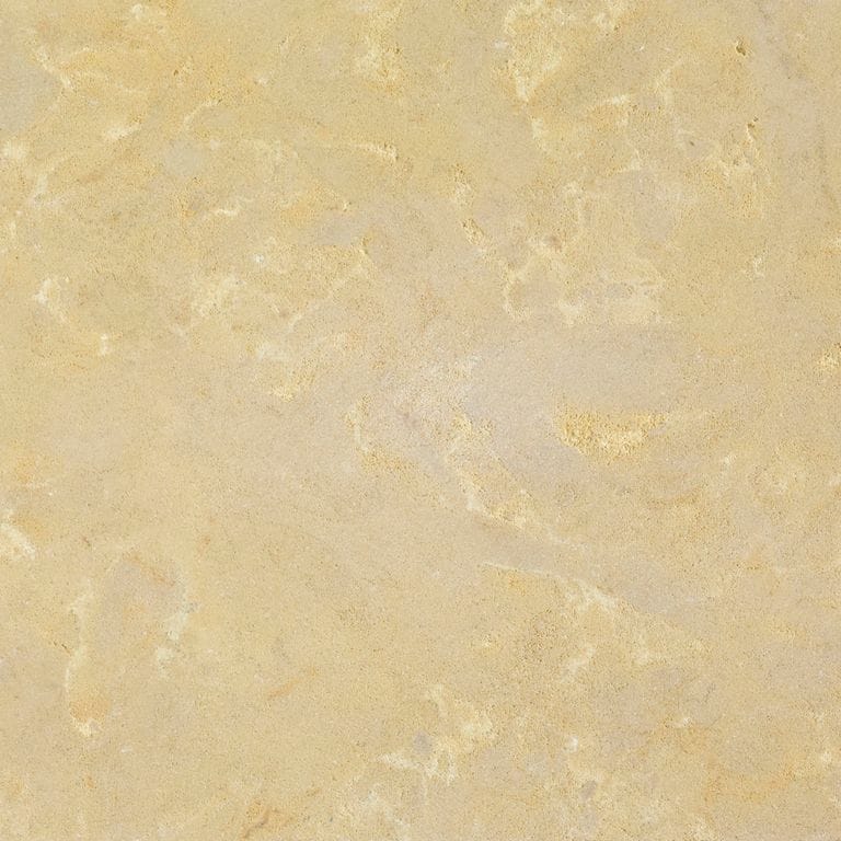 Color/Finish variation image for Glacier Buff Limestone. The surface finish shown is honed. Dominant colors shown are beige, orange/rust, yellow and tan; with a cream secondary. Exhibits "movement" and the color mix creates a warm feeling. Blotched and swirled color patterns.