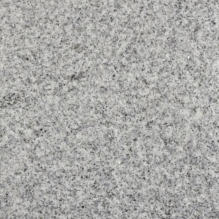 Color/Finish variation image for Blue Sky Granite. The surface finish shown is bush hammered. The dominant color shown is gray; with a white secondary. The color mix creates a cool feeling. Speckled color pattern.