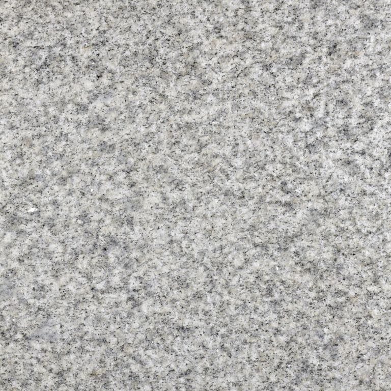 The surface finish shown is bush hammered. The dominant color shown is gray. The color mix creates a cool feeling. Speckled and coarse speckled color patterns. Contains some mica.