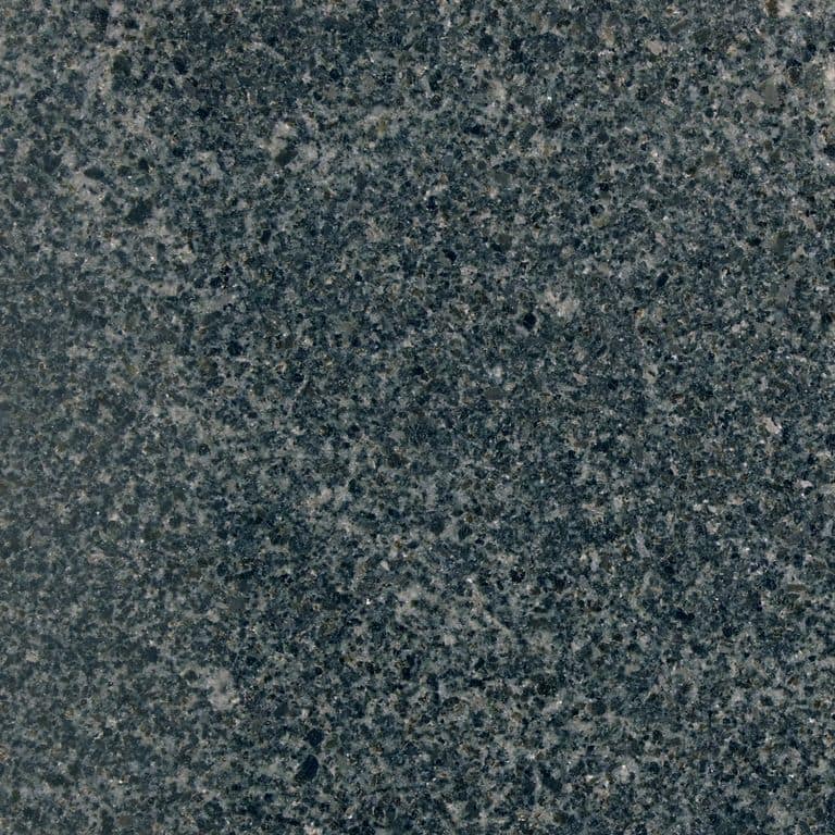 Color/Finish variation image for Granite - Virginia Mist. The surface finish shown is polished. The dominant color shown is gray. The color mix creates a cool feeling. Blotched and coarse speckled color patterns.
