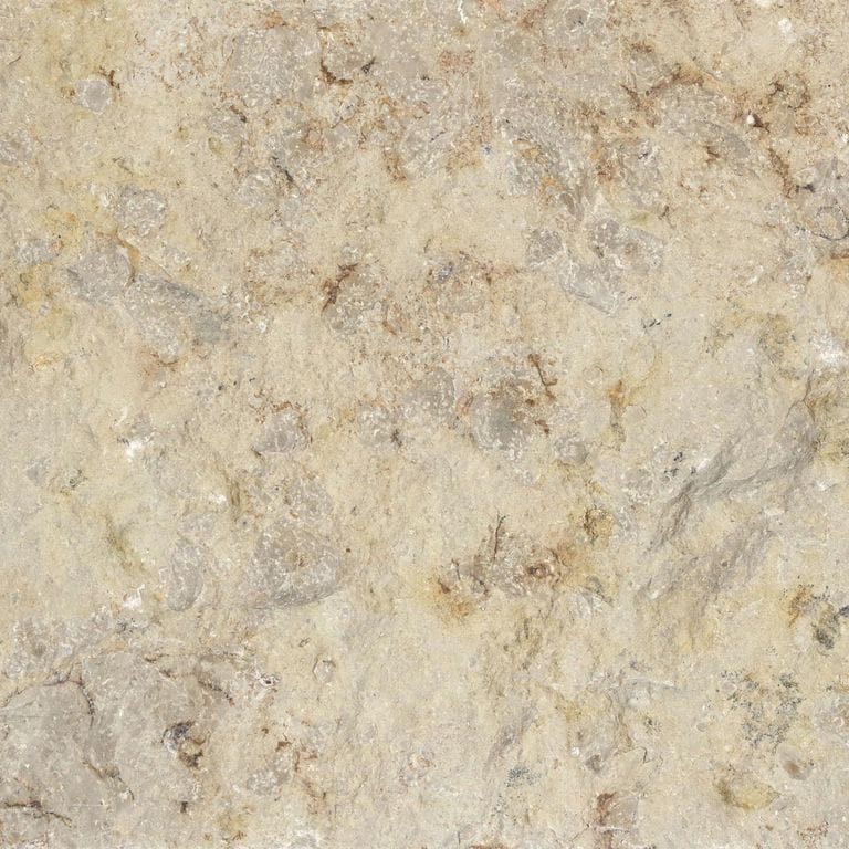Color/Finish variation image for Limestone - Bavarian Beige. The surface finish shown is split-face. Dominant colors shown are beige and tan; with brown, orange/rust and cream secondaries. Exhibits "movement" and the color mix creates a warm feeling. Blotched, random and cloudy color patterns.