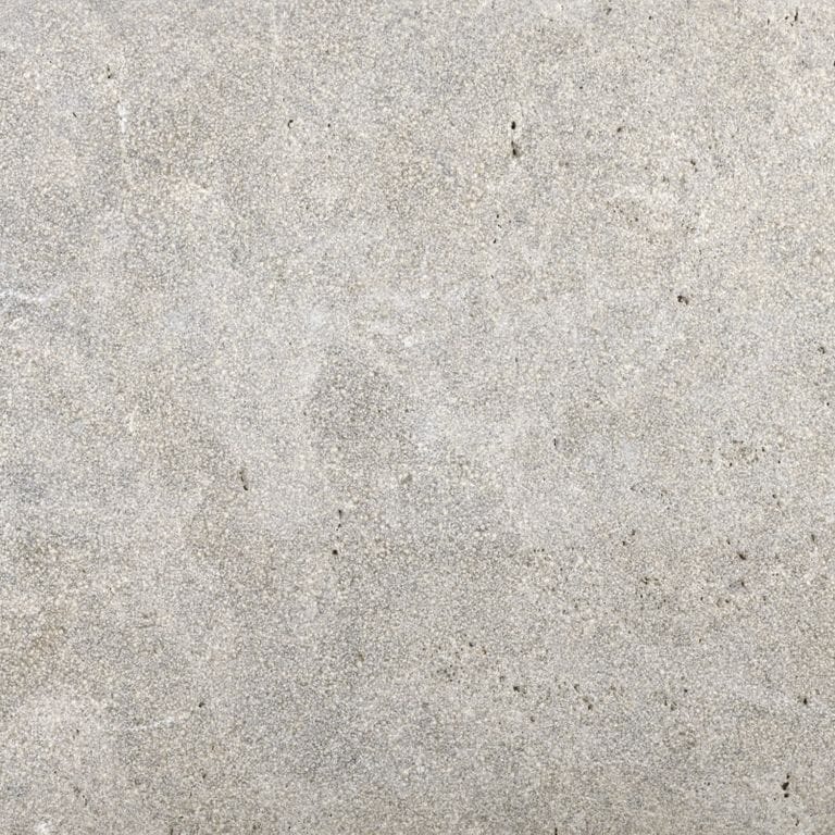 Color/Finish variation image for Limestone - Bavarian Dolomite. The surface finish shown is sand blasted. Dominant colors shown are beige and gray; with pink, white and cream secondaries. Random and cloudy color patterns.