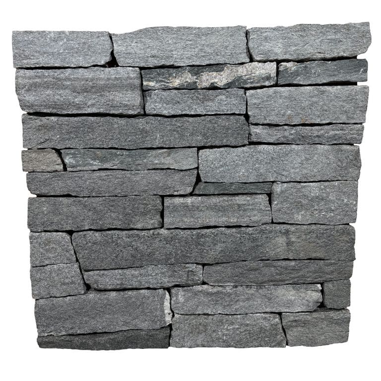 Best close-up image for Chester Granite Veneer. The surface finish shown is split-face. The dominant color shown is gray; with beige, brown and white secondaries. Exhibits "movement" and the color mix creates a cool feeling. Speckled and blotched color patterns.