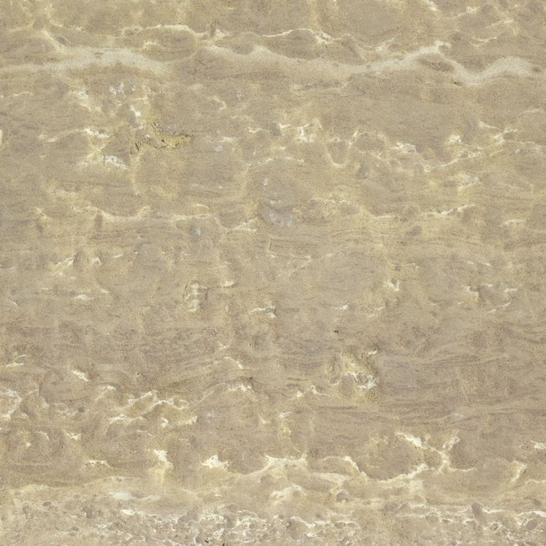 Color/Finish variation image for Sunset Canyon Limestone. The surface finishes shown are antiqued and brushed. Dominant colors shown are beige and tan; with brown, orange/rust and cream secondaries. The color mix creates a warm feeling. Blotched, linear and swirled color patterns.
