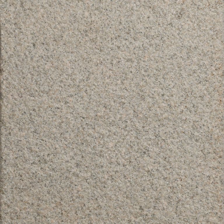 Color/Finish variation image for Beige Granite. The surface finish shown is flamed. The dominant color shown is gray. The color mix creates a warm feeling.