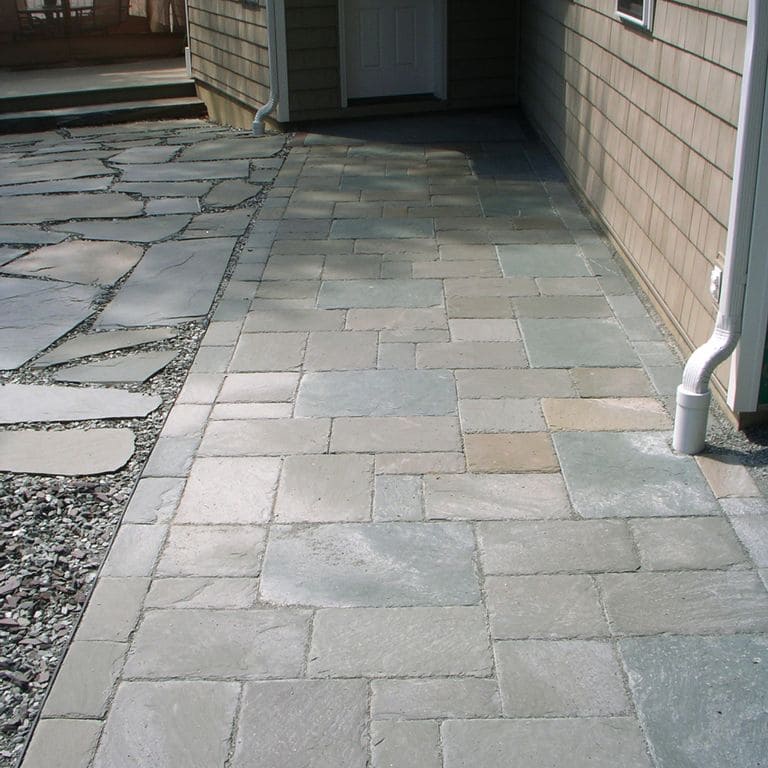 The image shows this material being used for path pavers and patio pavers.