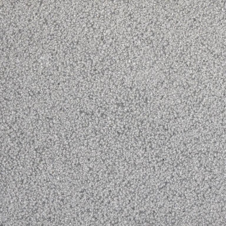 Color/Finish variation image for Polar Gray Limestone. The surface finish shown is bush hammered. The dominant color shown is gray; with beige and white secondaries. The color mix creates a cool feeling. Speckled color pattern.
