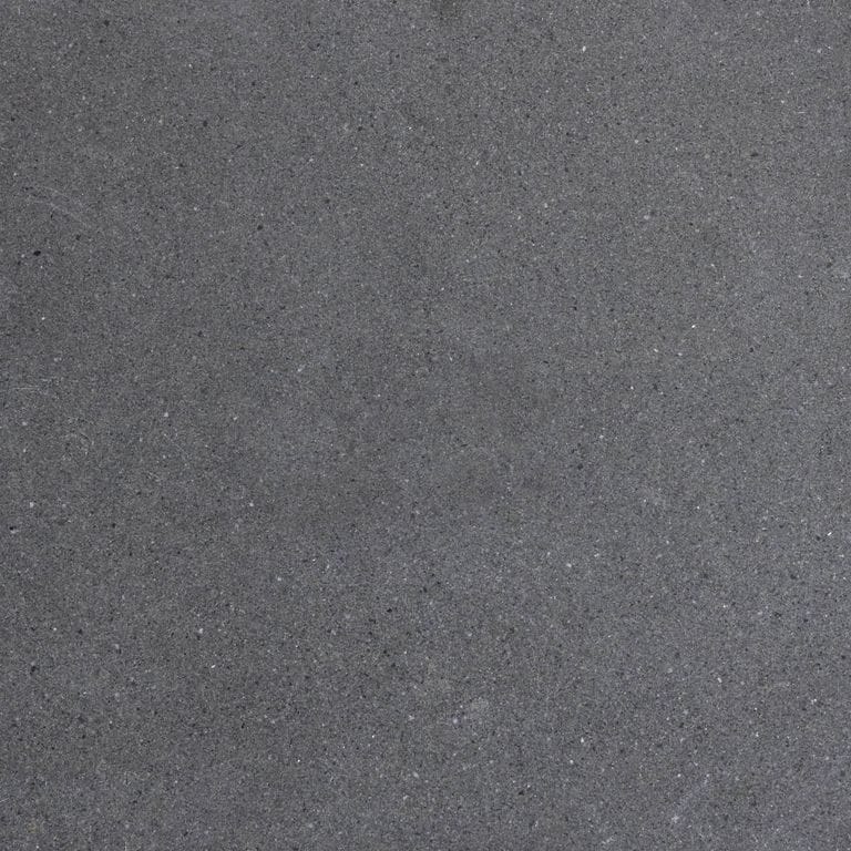 Color/Finish variation image for Polar Gray Limestone. The surface finish shown is honed. The dominant color shown is gray; with brown and purple secondaries. The color mix creates a cool feeling. Solid and fine speckled color patterns.