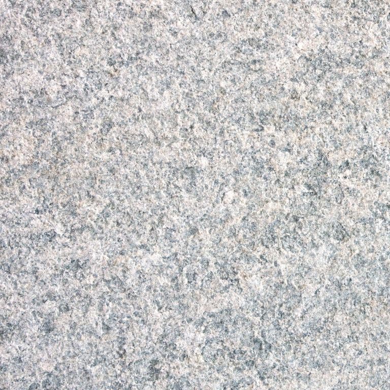 Color/Finish variation image for Gneiss - Pietra Italia Natural Cleft. The surface finish shown is sand blasted. Dominant colors shown are gray and white. The color mix creates a cool feeling. Speckled and coarse speckled color patterns.