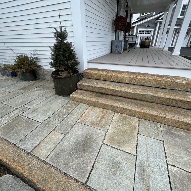Application image for Pietra Italia Full Color Gneiss. The image shows this material being used in a path pavers application. The surface finish shown is natural cleft. Dominant colors shown are beige and gray. The color mix creates a warm feeling.