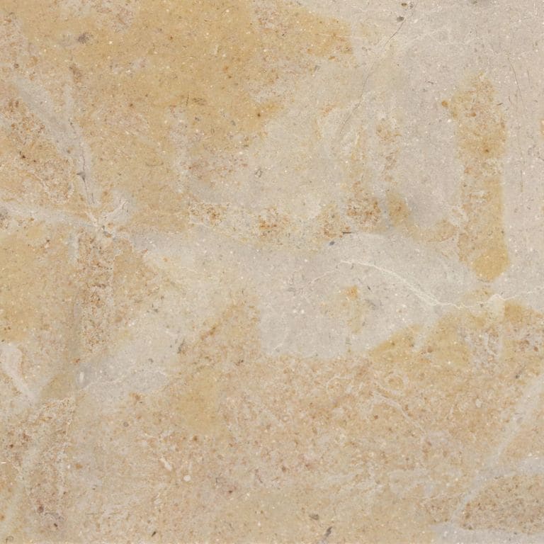 Swatch image for Limestone - Cenia Beige. The surface finish shown is honed. Dominant colors shown are beige and tan; with brown, orange/rust, pink and cream secondaries. Exhibits "movement" and the color mix creates a warm feeling. Blotched and random color patterns. Contains mineral inclusions.