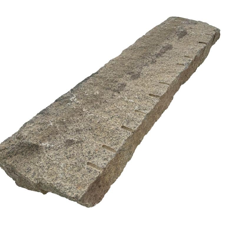 Oblique image for Reclaimed First Generation Granite Curbstone. The surface finish shown is . Dominant colors shown are brown, gray and tan. The color mix creates a warm feeling.
