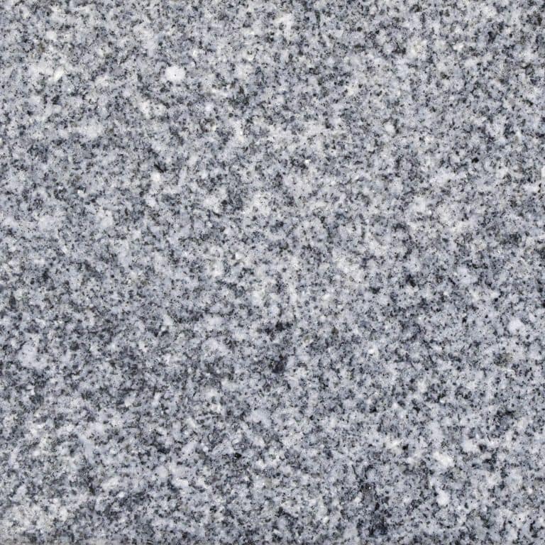 Color/Finish variation image for Gray Nisa. The surface finish shown is polished. Dominant colors shown are blue, gray and white. The color mix creates a cool feeling. Coarse speckled color pattern.
