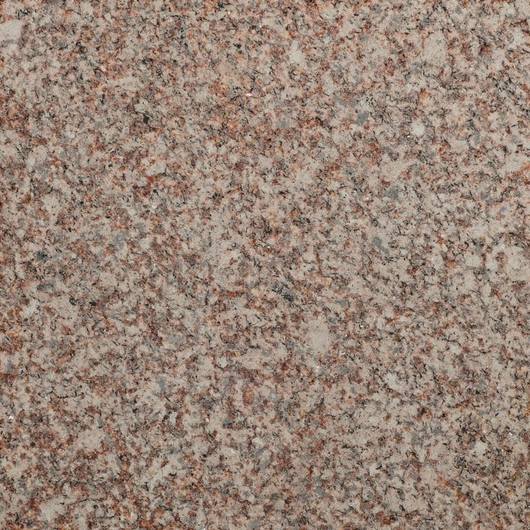 Color/Finish variation image for Yellow Wheat Granite. The surface finish shown is flamed. Dominant colors shown are orange/rust, pink and red. The color mix creates a warm feeling.