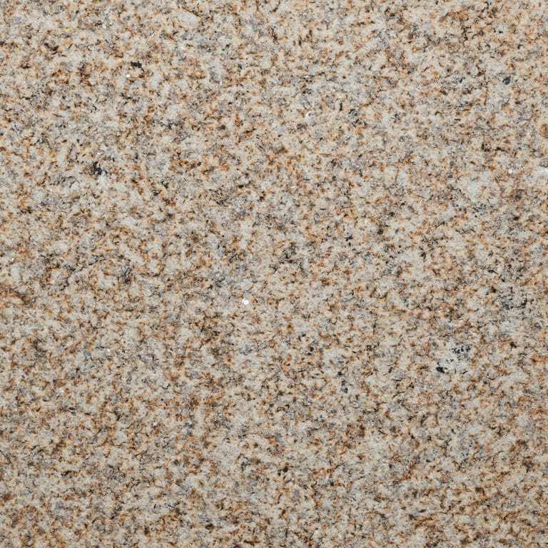 Color/Finish variation image for Yellow Wheat Granite. The surface finish shown is sand blasted. Dominant colors shown are yellow and tan; with brown, gray and white secondaries. The color mix creates a warm feeling. Cloudy and coarse speckled color patterns.