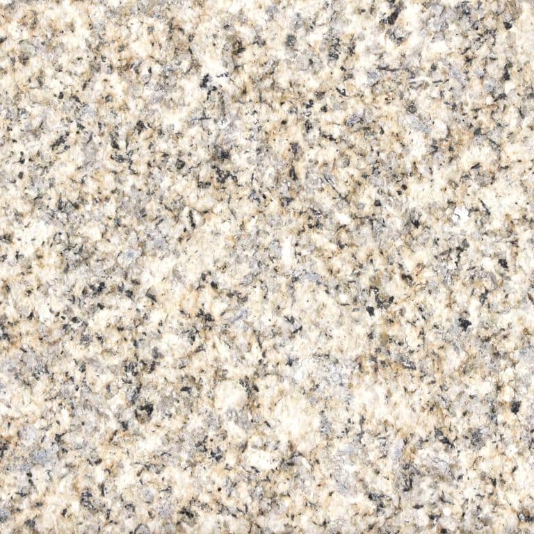 Color/Finish variation image for Yellow Wheat Granite. The surface finish shown is sand blasted. Dominant colors shown are beige, tan and cream; with brown, gray and white secondaries. The color mix creates a warm feeling. Coarse speckled and cloudy color patterns.