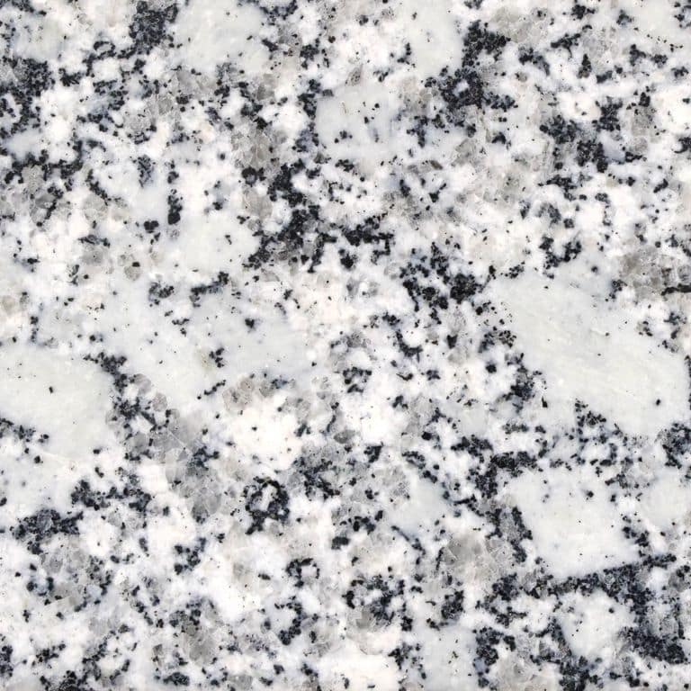 Color/Finish variation image for Gray Ice Granite. The surface finish shown is polished. Dominant colors shown are gray and white; with black and cream secondaries. The color mix creates a cool feeling. Blotched and coarse speckled color patterns.