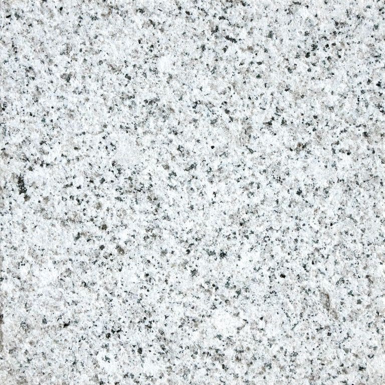 The surface finish shown is brushed. Dominant colors shown are gray and white. The color mix creates a cool feeling. Coarse speckled color pattern.