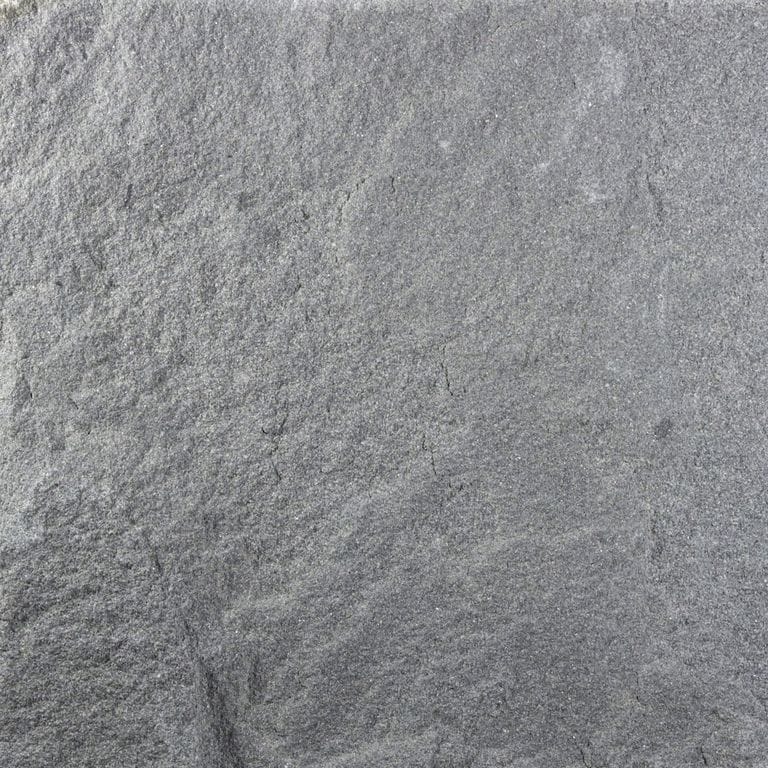 Color/Finish variation image for Bluestone - Sugus. The surface finish shown is split-face. The dominant color shown is gray; with blue and green secondaries. The color mix creates a cool feeling. Regular and random color patterns.