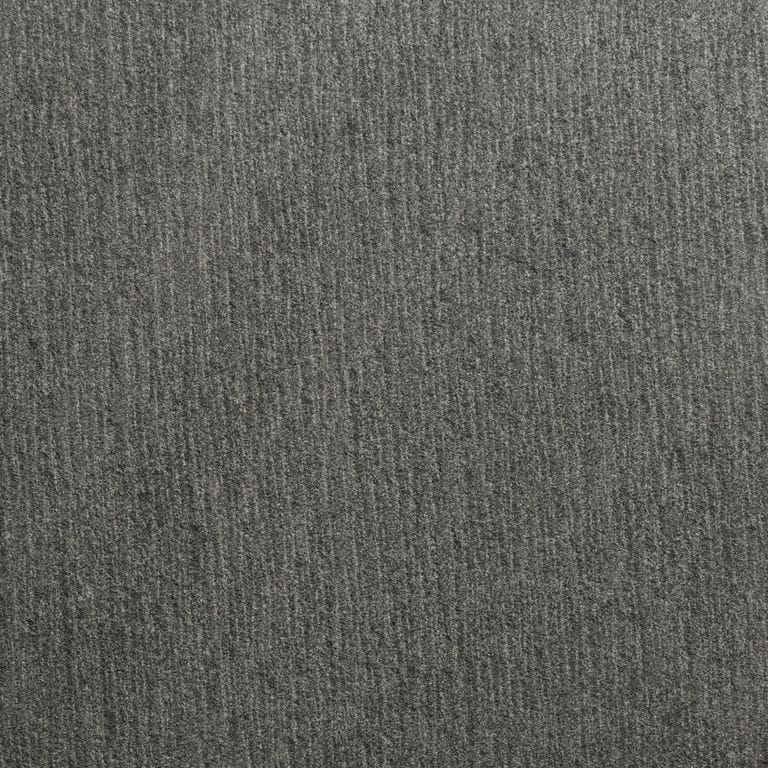 Color/Finish variation image for Sugus Black Sandstone. The surface finish shown is adze. Dominant colors shown are black and gray. The color mix creates a cool feeling.