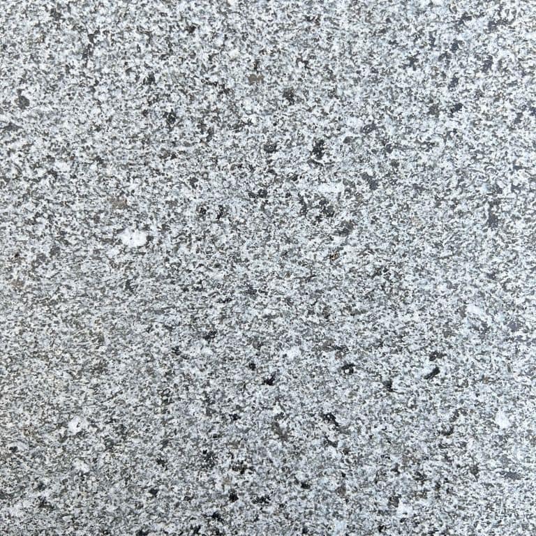 The surface finish shown is sand blasted. The dominant color shown is gray. The color mix creates a cool feeling. Speckled and coarse speckled color patterns.