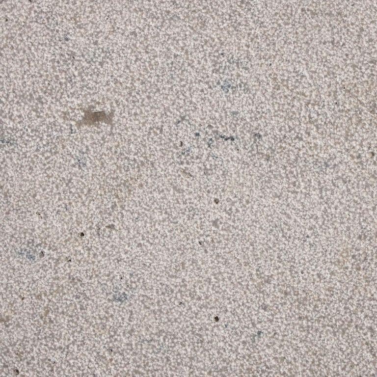The surface finish shown is sand blasted. The dominant color shown is gray. The color mix creates a cool feeling. Speckled and blotched color patterns.