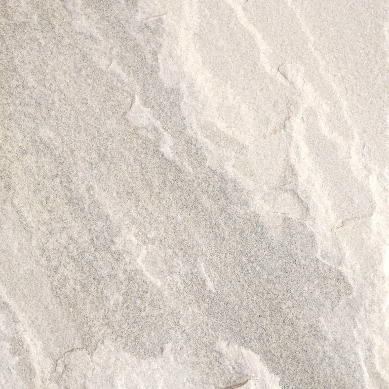 Color/Finish variation image for Golden Fossil Sandstone. Dominant colors shown are beige, white and cream; with gray, pink, purple and tan secondaries. Exhibits "movement". Linear color pattern.