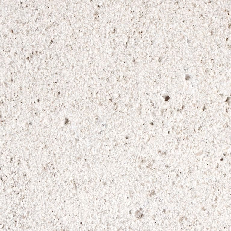 The surface finish shown is sand blasted. Dominant colors shown are beige, white and cream. The color mix creates a warm feeling. Speckled and blotched color patterns.