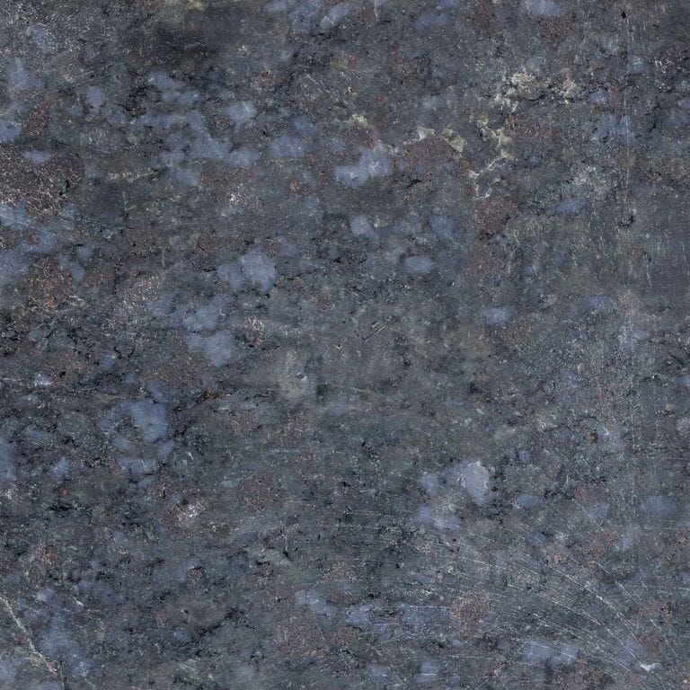 The surface finish shown is honed. Dominant colors shown are blue and gray. The color mix creates a cool feeling. Coarse speckled color pattern.