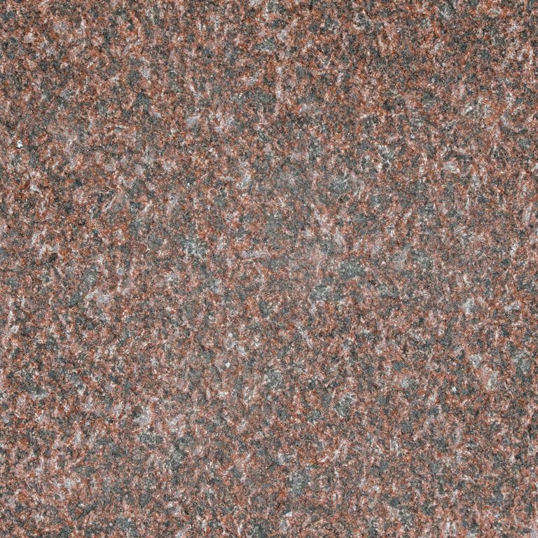 Color/Finish variation image for Granite - Princess Red. The surface finish shown is sand blasted. The dominant color shown is red. The color mix creates a warm feeling. Speckled and coarse speckled color patterns.