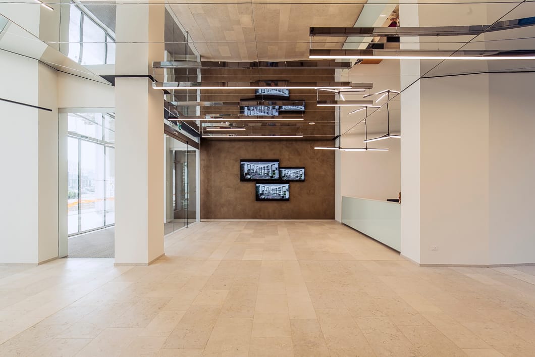 Application image for Veneto Beige Limestone - Interior Flooring. The image shows this product being used in an interior floor application. Dominant colors shown are beige and tan. The color mix creates a warm feeling.