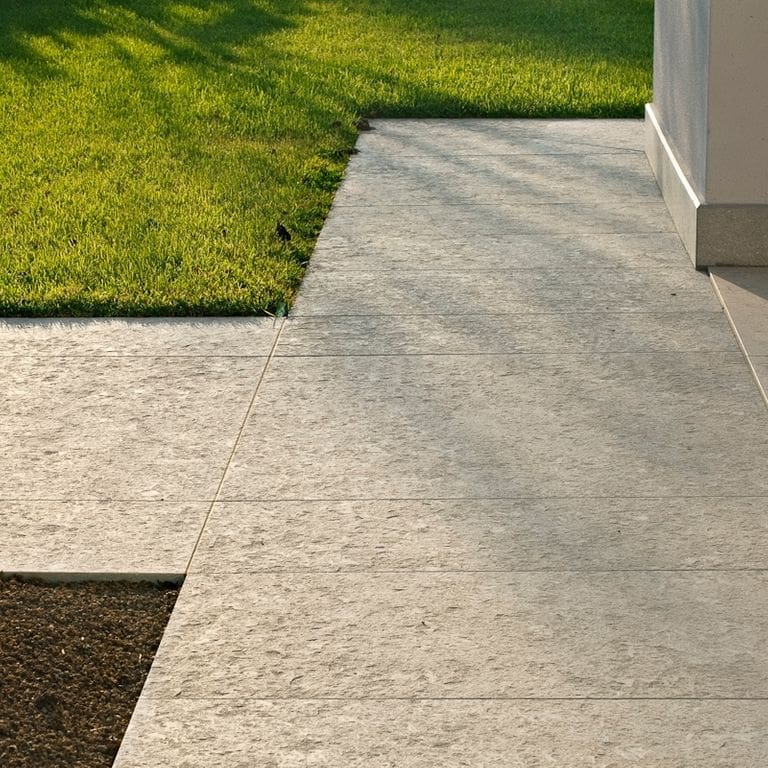 Application image for Veneto Olivo Limestone - Pavers. The image shows this product being used in a patio pavers application. Dominant colors shown are beige and tan. The color mix creates a warm feeling.