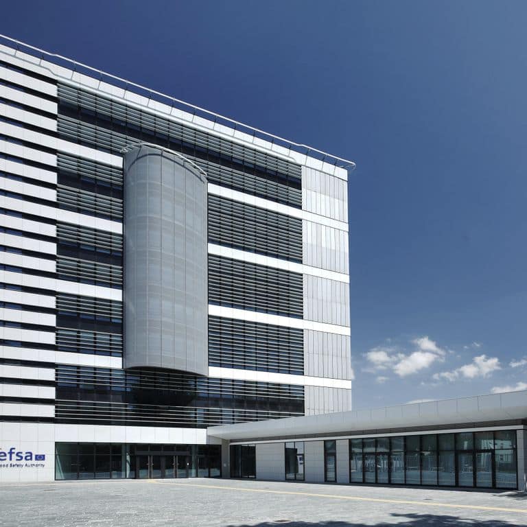 Application image for Veneto Olivo Limestone - Veneer. The image shows this product being used in a full bed veneer application. The surface finish shown is sand blasted. The dominant color shown is beige. The color mix creates a cool feeling.