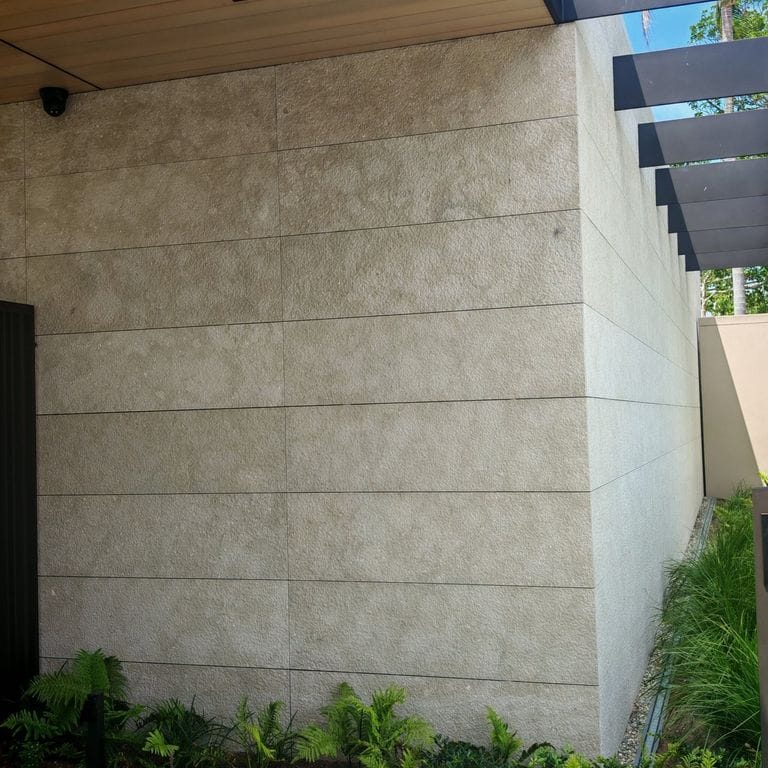 Application image for Veneto Olivo Limestone - Veneer. The image shows this product being used in a full bed veneer application. The surface finish shown is . Dominant colors shown are gray and tan. The color mix creates a cool feeling.