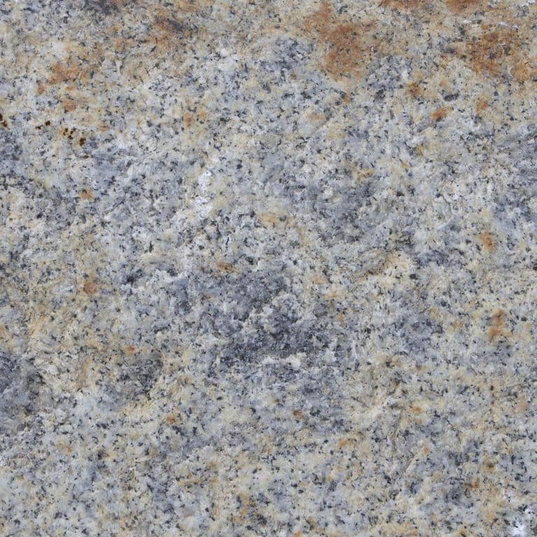 Color/Finish variation image for Reclaimed First Generation Curbstone - Split Bottom Riser Steps. The dominant color shown is gray; with blue, brown, orange/rust, white and tan secondaries. Speckled, blotched and cloudy color patterns. Contains mineral inclusions.